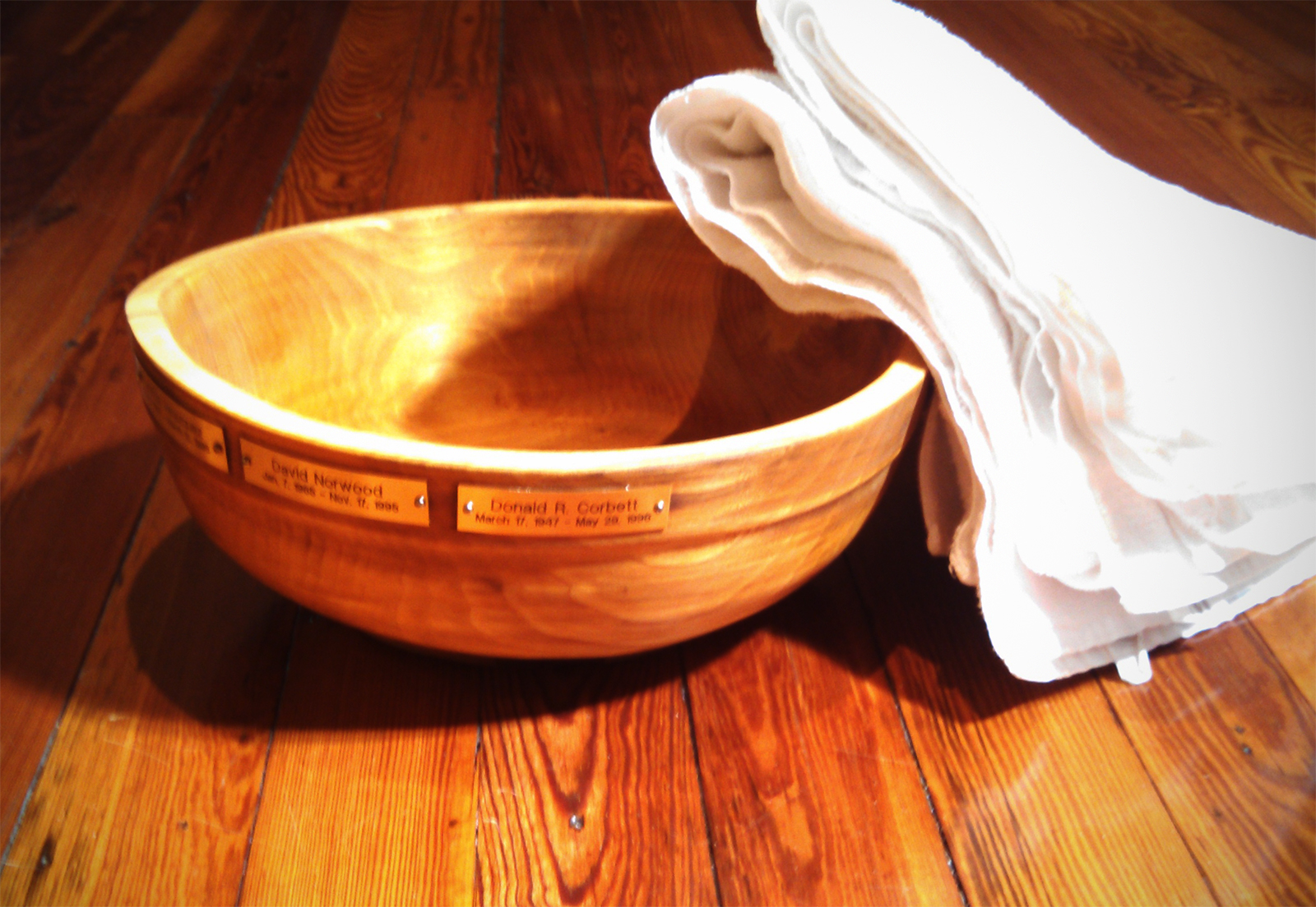 picture of wooden feet washing bowl.